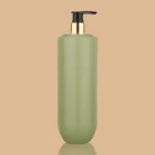 Sage green 1000ml HDPE matte lotion bottle with a black and gold pump dispenser.