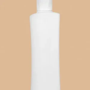 High-angle view of a 100ml slim white HDPE Jupiter-shaped plastic bottle with a white flip-top cap.