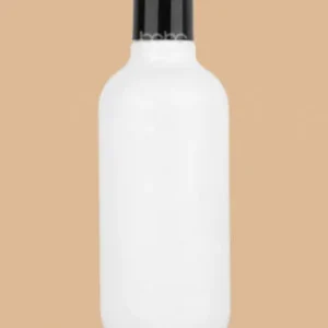 A 300ml white milky HDPE plastic bottle in an egg-shape design with a black disc top cap, isolated against a tan background.