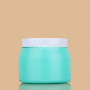 A 500g turquoise blue plastic spa jar with a white screw-on cap, displayed against a neutral tan background.