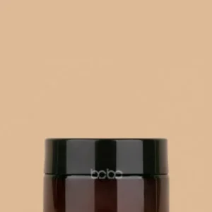 50gm amber PET cylindrical cosmetic jar with a glossy black screw cap.