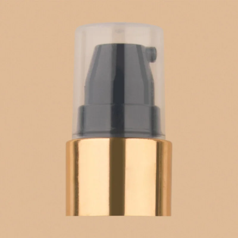 BLACK-GOLDEN-CREAM-PUMP-800x800 Black and gold cosmetic cream pump dispenser with a clear protective cap.