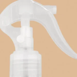 Transparent white plastic mini trigger sprayer for bottles.